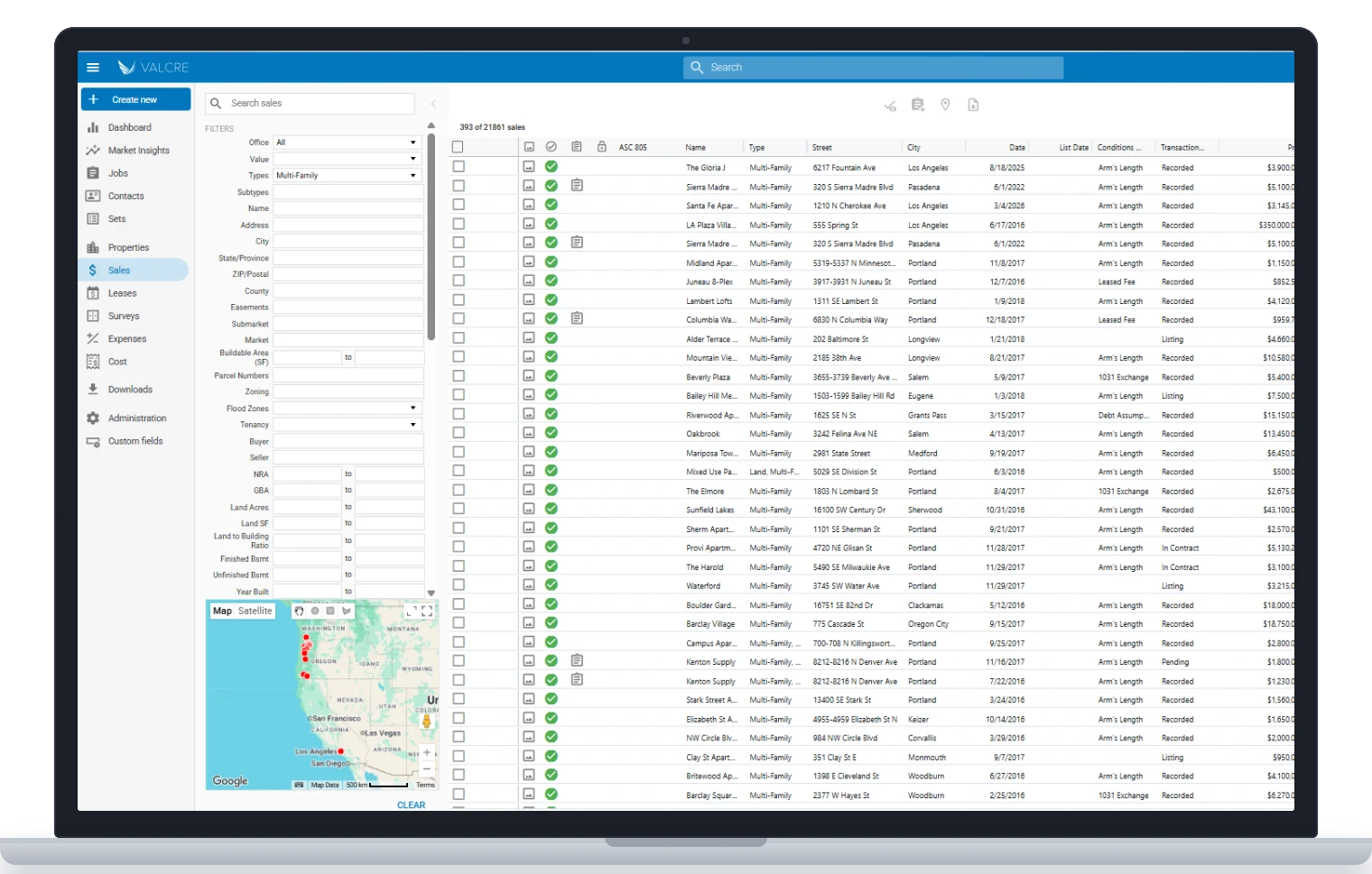 The Valcre Online sales comps list, with filters, a map and prices, on a laptop